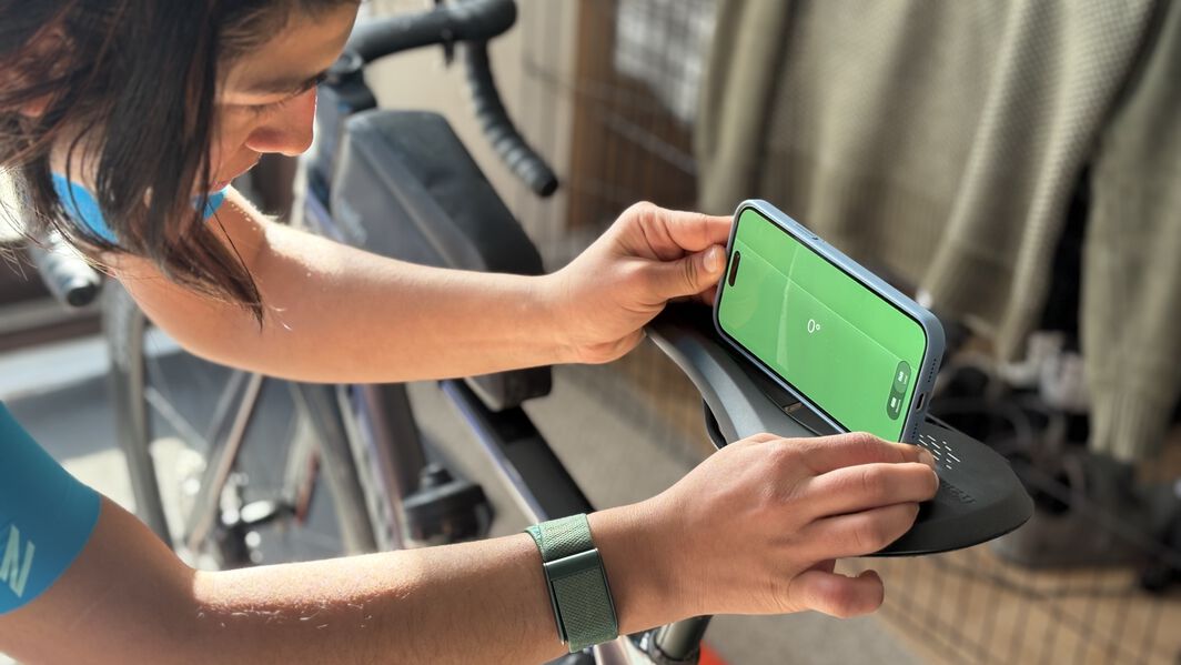 At no point of time should your saddle feel like it's tilted upwards. It should either be level or ever so slightly downwards. 